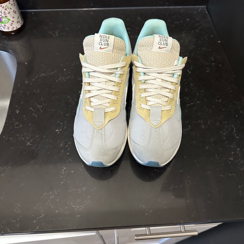 Nike Sun Club Sneakers in Light Blue and Yellow
